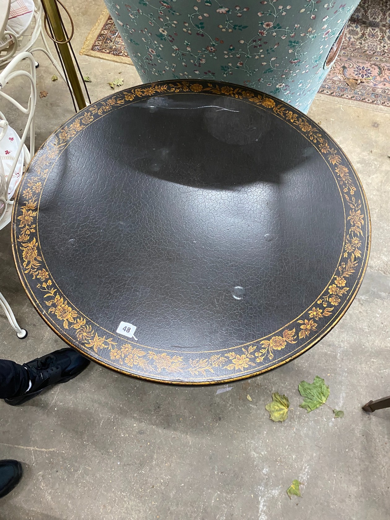 A Regency design painted parcel gilt circular centre table, diameter 74cm, height 71cm
